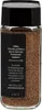 A jar of instant coffee with a label detailing its Fairtrade certification. Produktbild-Vorschau