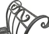 A close-up shot of the ornate metalwork of a garden bench. Produktbild-Vorschau