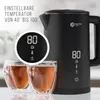 A black electric kettle with a digital display and two glasses of tea in front of it. Produktbild-Vorschau