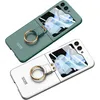 Two phone cases with ring holders are displayed against a white background. Produktbild-Vorschau