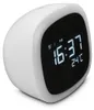 A white digital alarm clock with a black display showing the time and temperature. Anteprima dell’immagine prodotto
