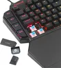 Close-up of a gaming keyboard with some keycaps removed, showing the mechanical switches. Produktbild-Vorschau