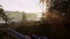 A first-person perspective of someone holding a rifle in a misty, wooded environment near a body of water. Náhled obrázku produktu