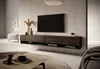 A modern living room with a wall-mounted TV and media console. Anteprima dell’immagine prodotto