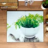 A cutting board set with a printed image of herbs in a mortar on a wooden table. Náhľad obrázku produktu