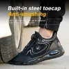 A person wearing a black safety shoe, with a car tire pressing against the shoe. Produktbild-Vorschau