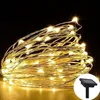 A coiled string of solar-powered LED lights with a small solar panel unit in the lower right corner. Podgląd zdjęcia produktu