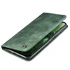 A green flip cover phone case is shown from a diagonal angle, with the phone inside. Produktbild-Vorschau