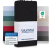 A stack of folded fitted sheets in various colors, with a black fitted sheet prominently displayed in the foreground. Anteprima dell’immagine prodotto