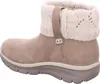 A side view of a taupe boot with a cream knitted cuff. Voir les images du produit