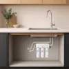 A water filter system installed under a kitchen sink. Produktbild-Vorschau