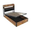 A bed frame with a slatted base lifted to reveal storage space underneath. Produktbild-Vorschau