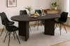 A dining room scene with an oval table and chairs. Produktbild-Vorschau