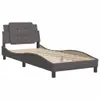 A gray bed frame with a tufted headboard and wooden slats is shown against a white background. Produktbild-Vorschau