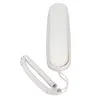 A white telephone handset with a coiled cord, isolated on a white background. Náhled obrázku produktu