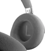 A close-up view of a gray gaming headset, focusing on the ear cup and headband connection. Produktbild-Vorschau