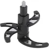 A close-up studio shot of a black food processor blade attachment. Produktbild-Vorschau