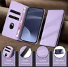 A purple phone case with card slots and a stand function, shown with inset diagrams highlighting its features. Produktbild-Vorschau