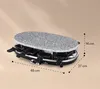 A raclette grill with dimensions indicated by dashed lines and measurements. Náhled obrázku produktu