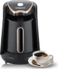 A black SOKANY electric Turkish coffee maker with gold accents is shown next to a cup of coffee and coffee beans. Podgląd zdjęcia produktu