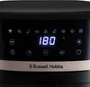 Close-up of the control panel of a black air fryer with a gold band, showing digital display and icons. Produktbild-Vorschau