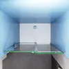 A modern shower enclosure with a glass door and a white shower tray, set against blue tiled walls. Produktbild-Vorschau