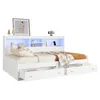 A white bed with drawers and a headboard with LED lighting. Produktbild-Vorschau
