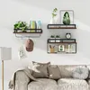 A living room scene with shelves mounted on the wall above a sofa. Produktbild-Vorschau