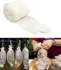 A collage showing a roll of white netting and a person using it to wrap meat for smoking or cooking. Produktbild-Vorschau