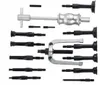 A collection of automotive tools, specifically a bearing puller set, laid out on a white background. Voir les images du produit