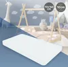 A white mattress is shown in the foreground, with a child's bedroom scene in the background featuring a wooden teepee bed, stuffed animals, and decorative clouds. Náhľad obrázku produktu