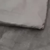 A close-up view of a folded gray blanket. Náhľad obrázku produktu