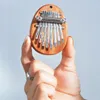Mini kalimba - 8 touches - bois d'acajou - piano à pouces Voir les images du produit 9