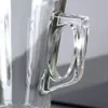 A close-up shot of the handle of a clear glass mug. Podgląd zdjęcia produktu