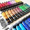 A collection of acrylic paint tubes arranged in rows on a white background, with a small booklet featuring an owl illustration. Náhled obrázku produktu