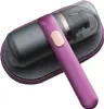 A close-up, studio shot of a purple and gray handheld vacuum cleaner with a transparent dustbin. Produktbild-Vorschau