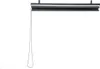 A retractable awning is mounted on a wall, with its cord hanging down. Voir les images du produit