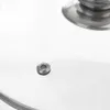 A close-up shot of a pot lid with a steam vent. Náhled obrázku produktu