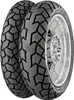 Two motorcycle tires are shown, one in front of the other, with one mounted on a silver rim. Produktbild-Vorschau