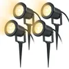Four black garden spotlights with stakes, emitting warm yellow light. Produktbild-Vorschau