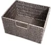 A woven storage basket with handles. Anteprima dell’immagine prodotto
