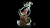 A collectible figurine of Aang from Avatar: The Last Airbender, displayed on a rocky base with swirling effects. Produktbild-Vorschau