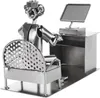 A metal figurine of a person sitting at a desk with a computer. Náhled obrázku produktu