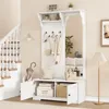 A white entryway hall tree with a mirror, coat hooks, and storage cabinets is shown in a home entryway next to a staircase. Produktbild-Vorschau