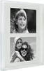A white multi-photo frame with two black and white photos, one of a young girl and another of a woman and child. Náhled obrázku produktu