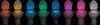 A row of illuminated toilet bowls in different colors against a black background. Voir les images du produit