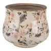 A ceramic planter with a floral pattern. Anteprima dell’immagine prodotto