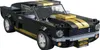 A black and gold Lego model of a Shelby GT 350H car. Anteprima dell’immagine prodotto