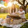 A mother and child are having a birthday party in the garden, with a treasure chest filled with toys. Náhľad obrázku produktu