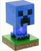 A blue Minecraft Creeper lamp on a grassy base. Náhled obrázku produktu